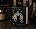 Book of Spells Magick Cat Energy black book-shaped mug front view
